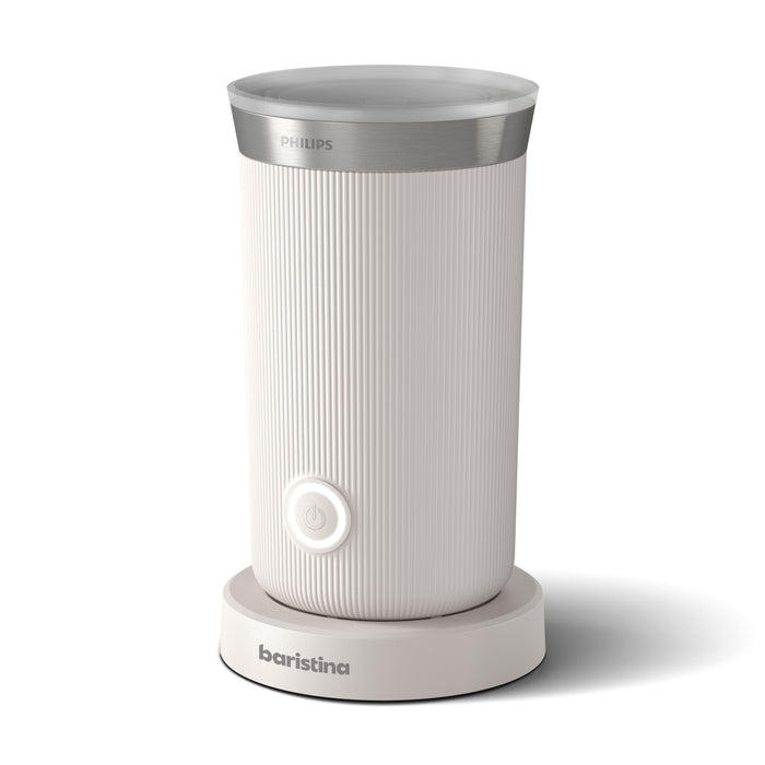 Philips Baristina milk frother: Close-up of a white, ribbed appliance with a silver top and a power button.