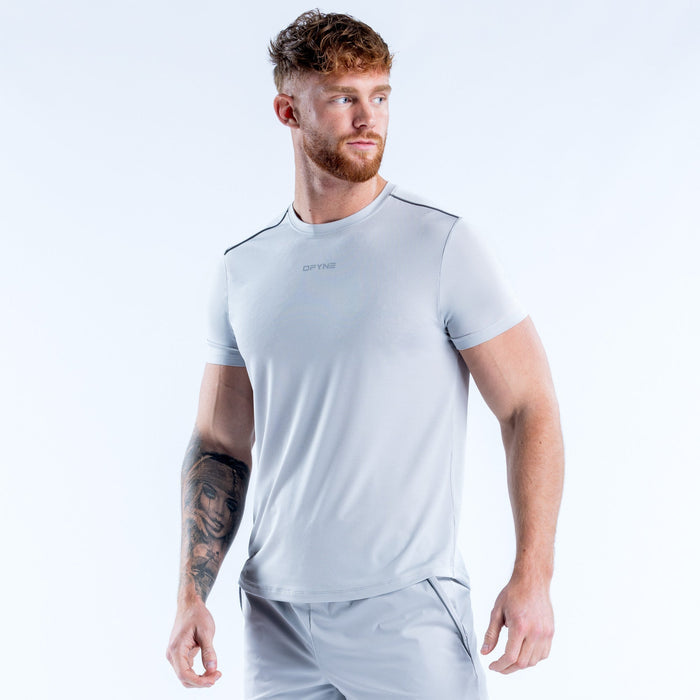 Light blue performance crew-neck T-shirt front view with small chest logo