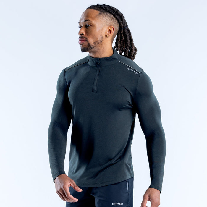Dark quarter-zip athletic pullover with stand collar and long sleeves, side view