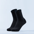 Pair of black crew socks with ribbed knit and smooth cuffs.