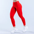 Red Defy leggings with full-length slim fit and wide waistband