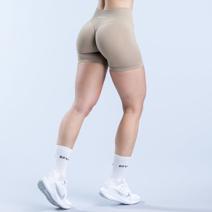 4.5-inch Defy athletic shorts, taupe, back view with smooth contours