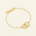Gold bracelet with a clasp on a white background