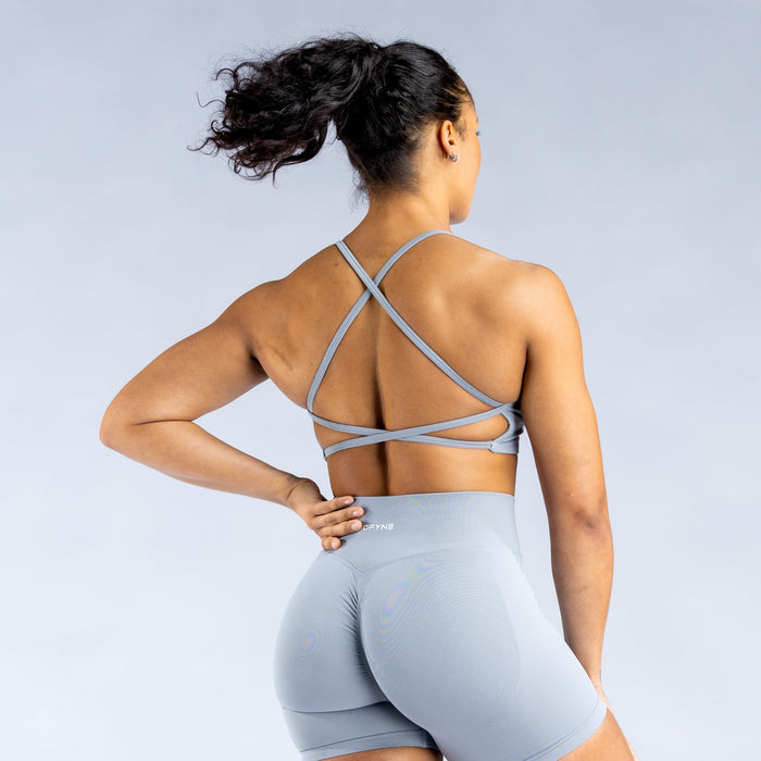Light blue backless sports bra with crisscross open-back straps