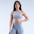 High-neck backless sports bra, light blue-gray, racer back with crisscross straps