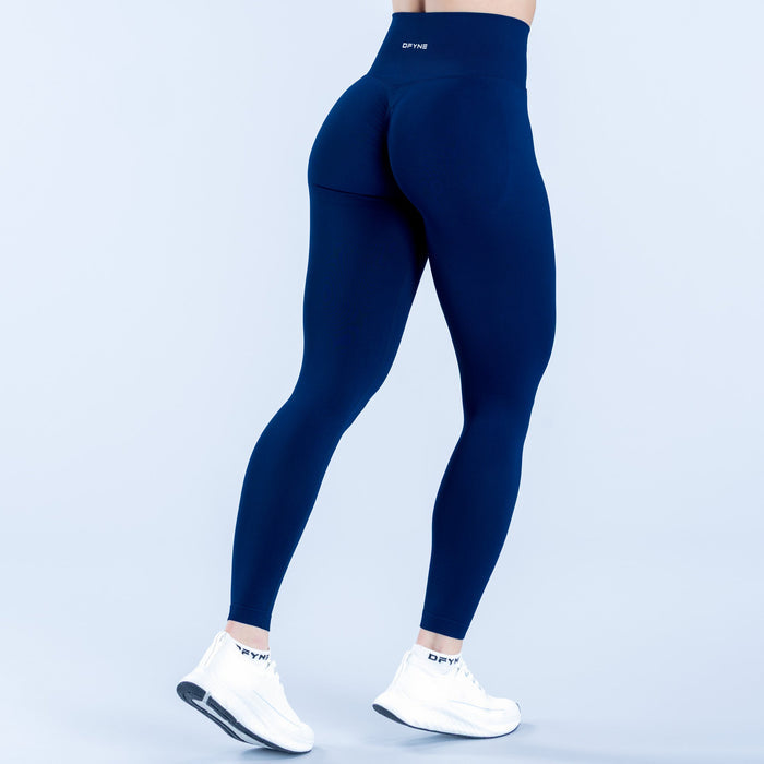 Dark blue high-waist leggings with subtle seam and small logo on thigh