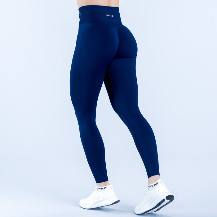 Dark blue leggings with small logo near waistband and stitched back seam