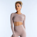 Mocha taupe long-sleeve crop top with crew neck and fitted stretch fabric.