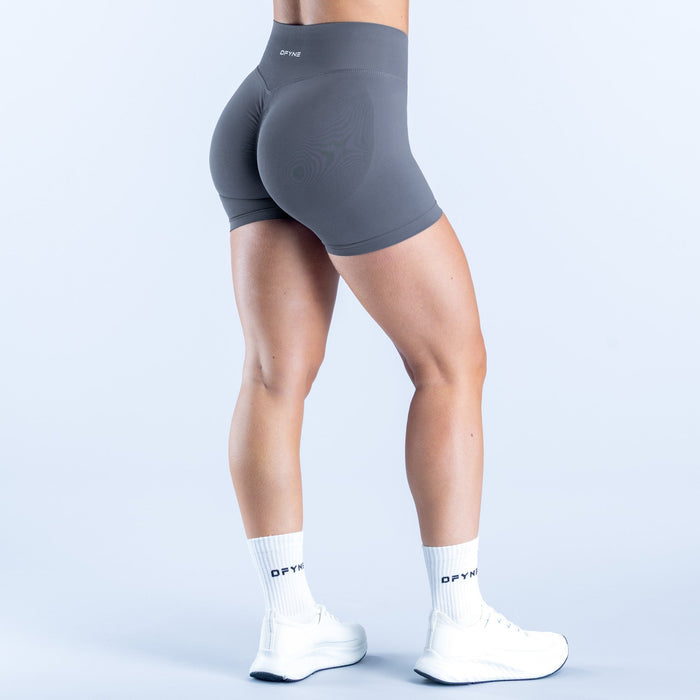 Dark gray 4.5-inch performance shorts, back view with smooth, fitted stretch fabric.