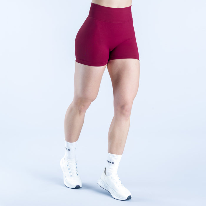 4.5-inch athletic shorts in maroon with smooth fabric and small white logo