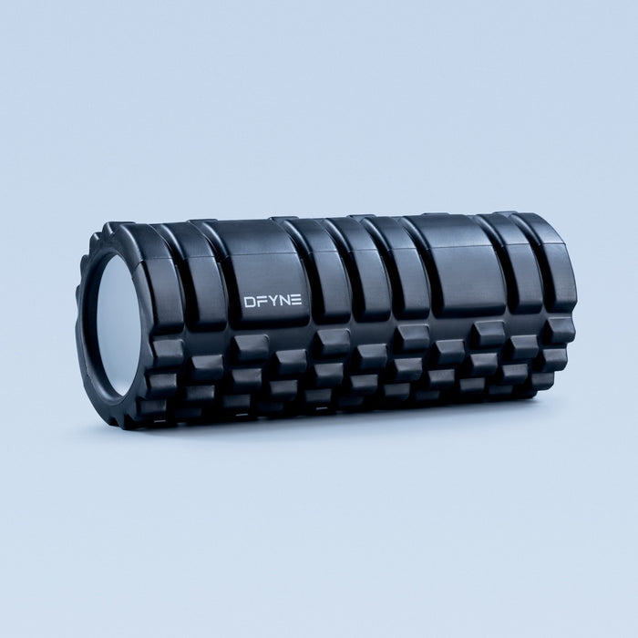 Foam roller with dark textured surface and DFYNE logo.