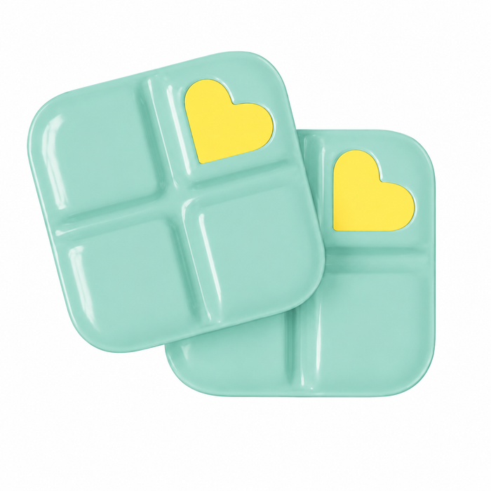 Two light blue divided plates containing Glutathione Troche yellow heart design.