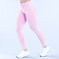 Light pink full-length leggings with smooth waistband, side view