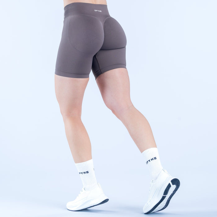Dark gray 6.5-inch bike shorts with logo tag at back waistband