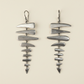 Large fishbone drop earrings with layered metallic gray curved pieces and fishhook backs