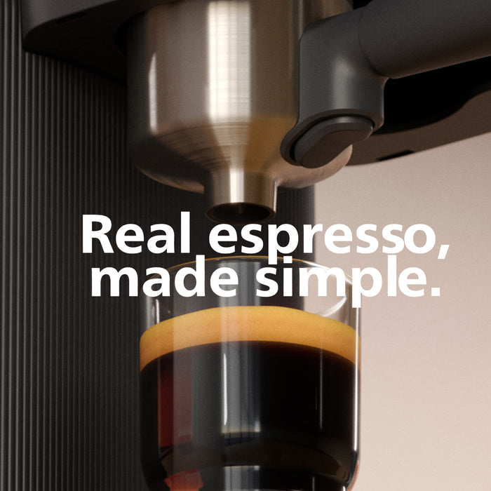 Espresso being brewed into a glass, with text 'Real espresso, made simple.'