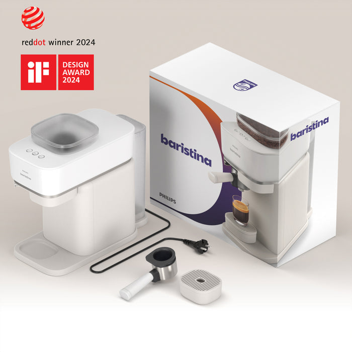 Philips baristina coffee machine with packaging and accessories on a light background
