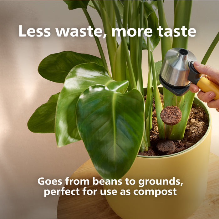 Person using a coffee grinder to add compost to a potted plant with text about composting.