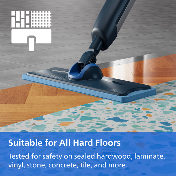 A close-up of a floor cleaner head in blue and black, shown on a terrazzo-patterned floor over a wood floor, with a text banner at the bottom stating 'Suitable for All Hard Floors' and a white icon in the top left.