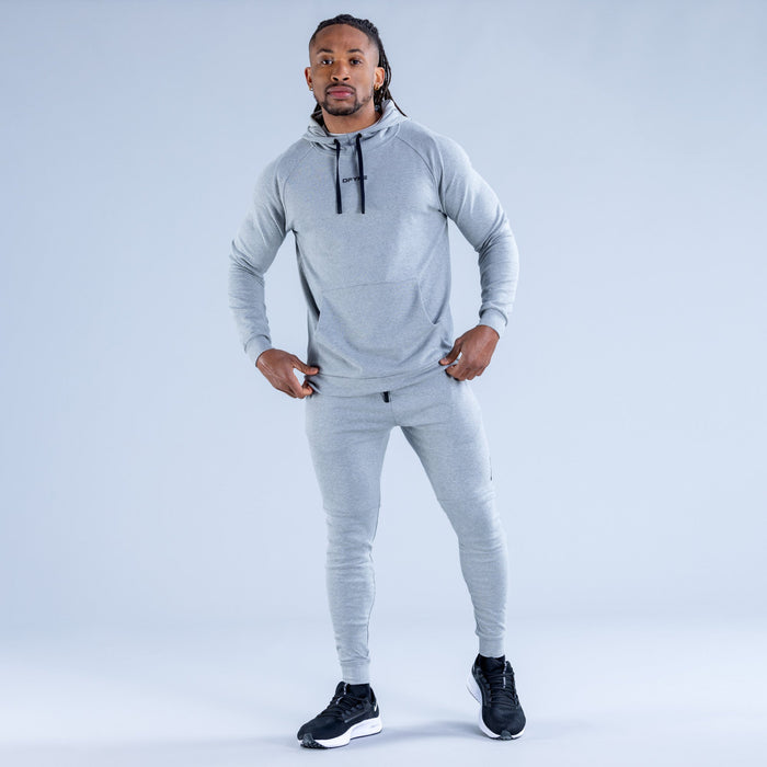Light gray midweight pullover hoodie with hood drawstrings and kangaroo pocket, front view