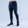 Dark navy tapered jogger pants with elastic waistband, drawstring, and zip pockets
