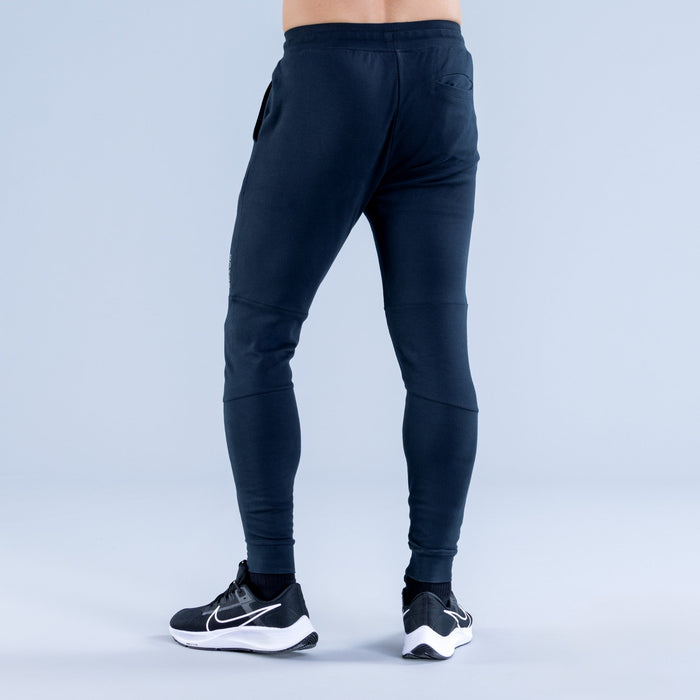 Dark navy tapered jogger pants with side pocket and elastic ankle cuffs