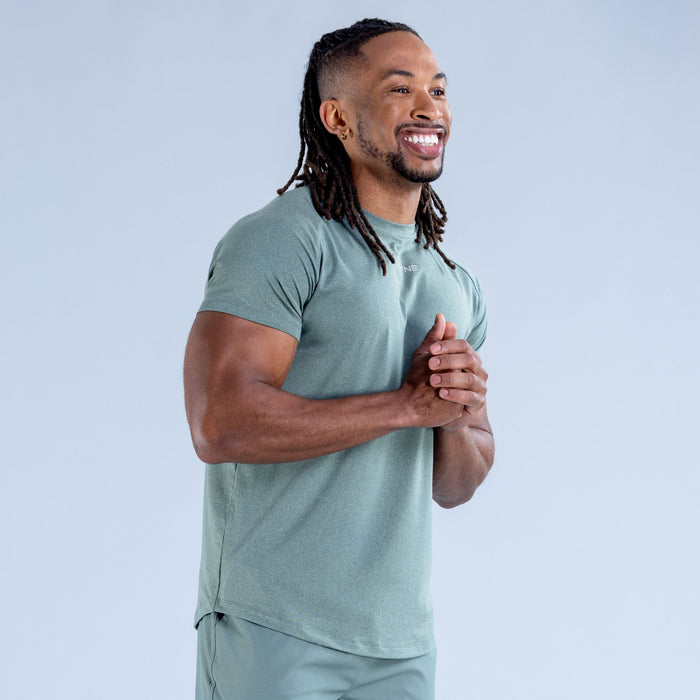 Stealth training t-shirt, teal crew neck, front view with chest logo