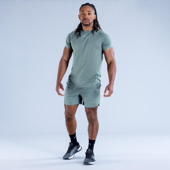 Stealth training t-shirt, teal crew neck, worn with matching athletic shorts